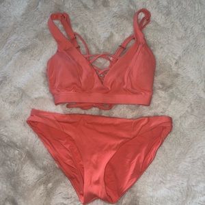 Size medium, coral color, cute bikini set. Slightly used, limited edition.